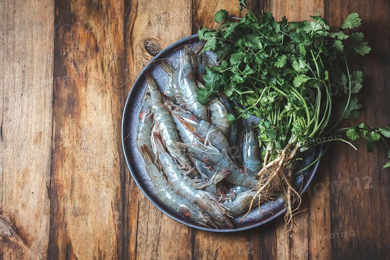 Food, Food, Raw seafood. Fresh shrimps with cilantro gray plate. Wooden backround