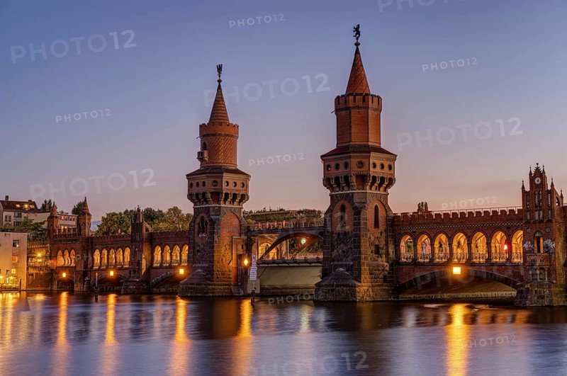 The beautiful Oberbaum Bridge over the Spree in Berlin at dusk