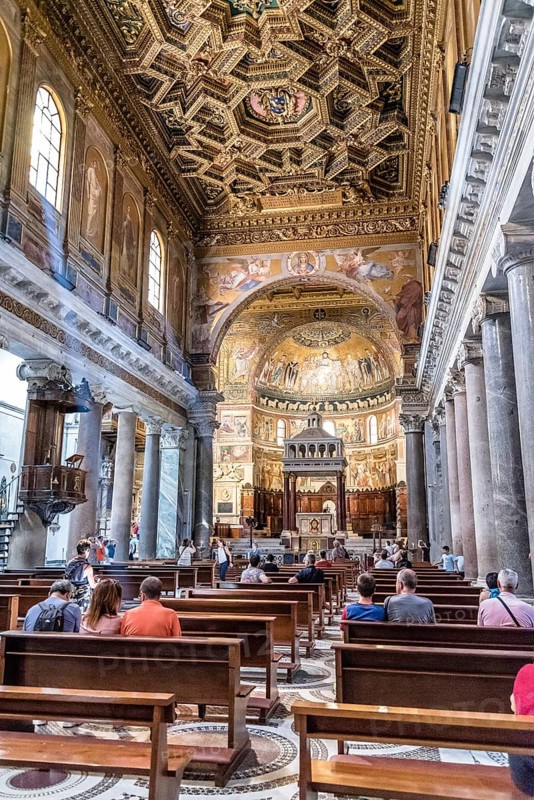Rome, Italy, August 18, 2016: Interior view of church of Santa Maria in Trastevere. It is a titular minor basilica in the Trastevere district of Rome, and one of the oldest churches of Rome, Europe