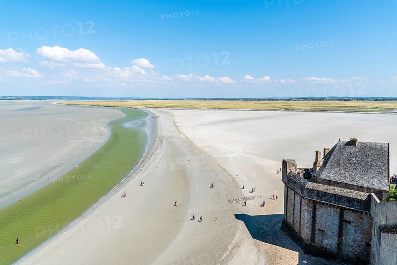Mont Saint Michel, France, July 25, 2018: View of the bay of Mont Saint Michel from the ramparts at low tide, Europe