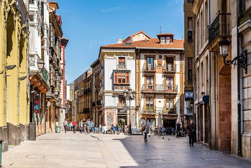Oviedo, Spain, April 1, 2019: Street with traditional houses in historic city center, Europe