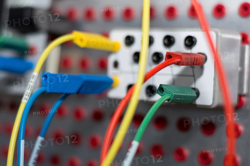 Close-up of a control circuit with coloured cables