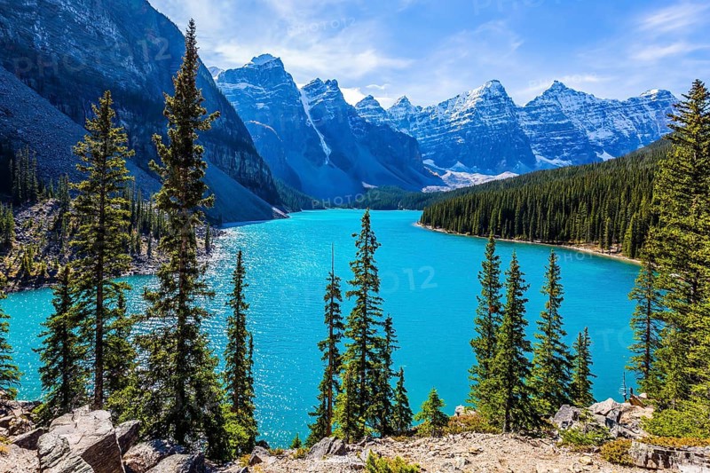Lake Moraine with water of emerald color in the Valley of the Ten Peaks. Park Banff, Canadian Rockies, Province of Alberta. The concept of ecological, photographic and active tourism