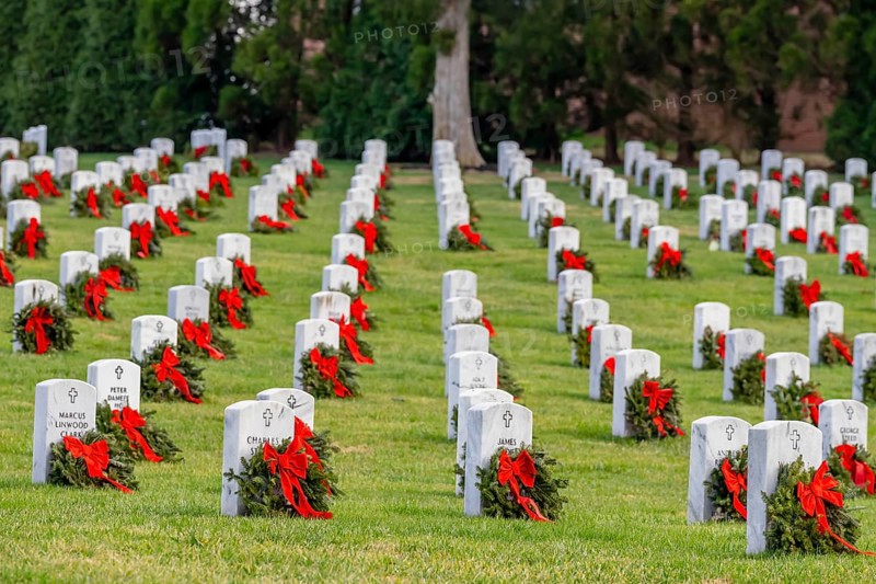 Atop a hill, a veterans cemetery with white headstones and the American flag evokes deep honour, sacrifice, and enduring national pride, Salisbury, United States of America