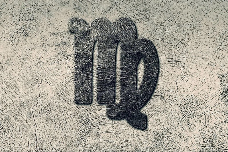 Virgo Zodiac Black Grunge Sign on Light Gray Background
