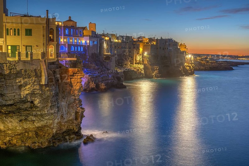 The cliffs of Polignano a Mare in Apulia, Italy, at dusk, Europe