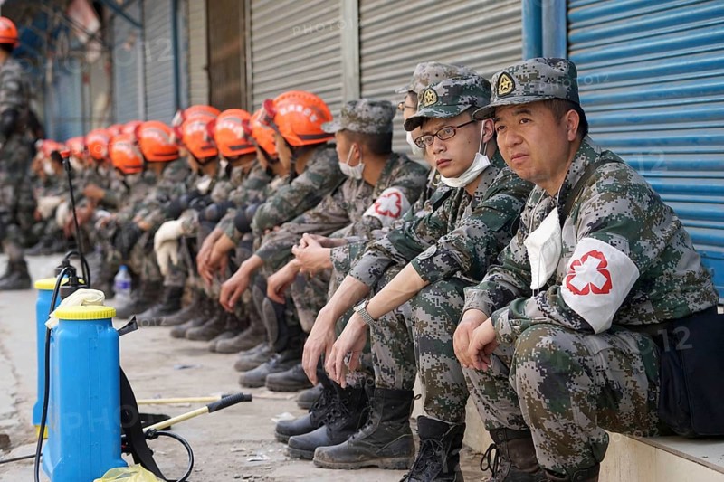 Rescue personnel resting, nepal, asia