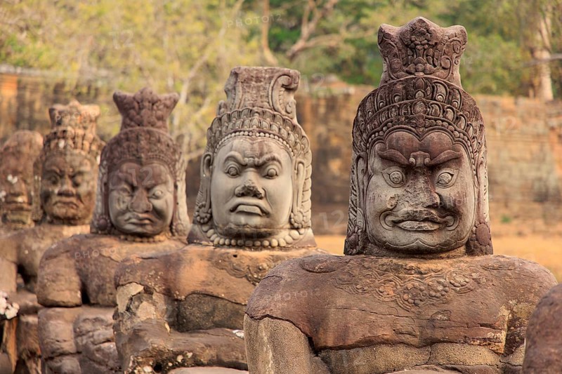 Balustrade with stone gods and demons on the bridge to the southern Tor tor of Angkor Thom