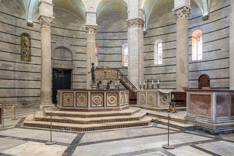 Pisa, Italy, 29 June 2023: Baptistery interior, basilica altar, catholic church. Italy travel destination, Europe