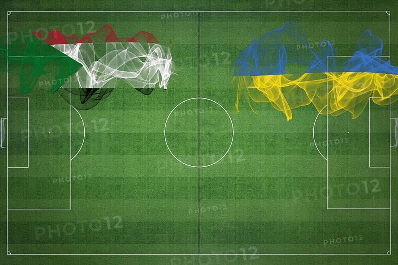 Sudan vs Ukraine Soccer Match, national colors, national flags, soccer field, football game, Competition concept, Copy space