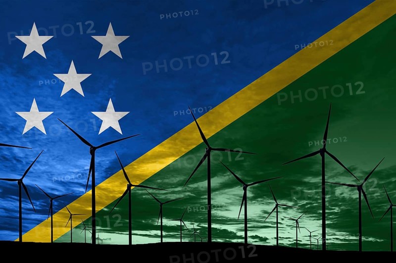 Solomon Islands flag wind farm at sunset, sustainable development, renewable energy Wind Turbines
