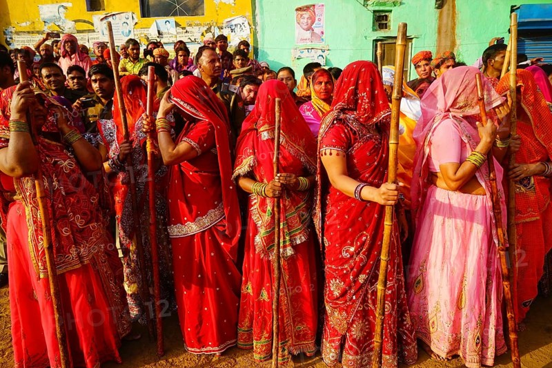 Women with sticks, Lathmar Holi festival, Mathura, Uttar Pradesh, India, Asia