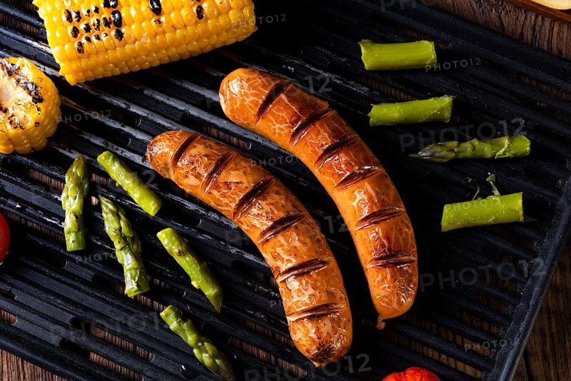 Grilled krakauer with french fries and green salad