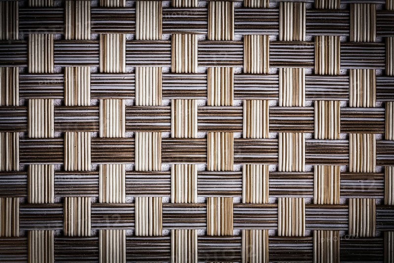 Texture old dusted wicker mat close up