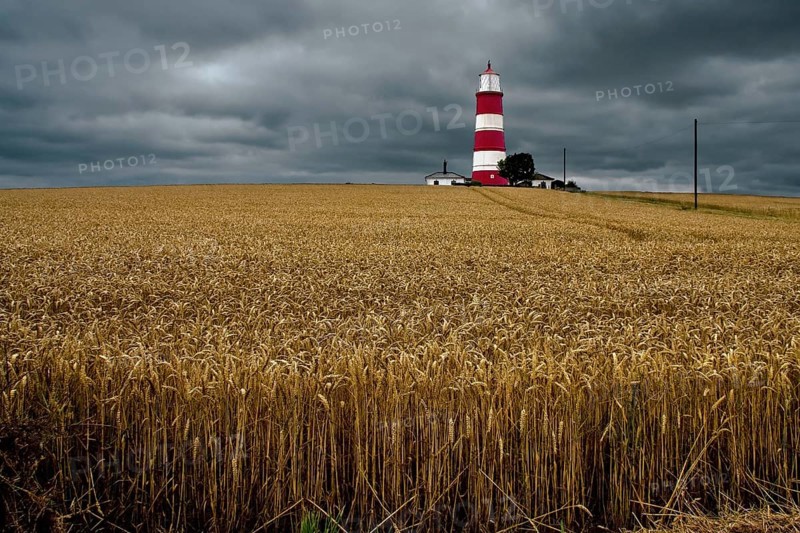 HAPPISBURGH, NORFOLK, UK - AUGUST 6 : Storm approaching the Lighthouse at Happisburgh in Norfolk on August 6, 2008