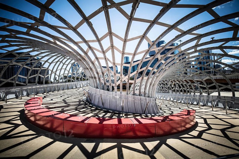 The iconic architecture of Webb Bridge on a warm spring morning in the Docklands area of Melbourne, Victoria, Australia, Oceania