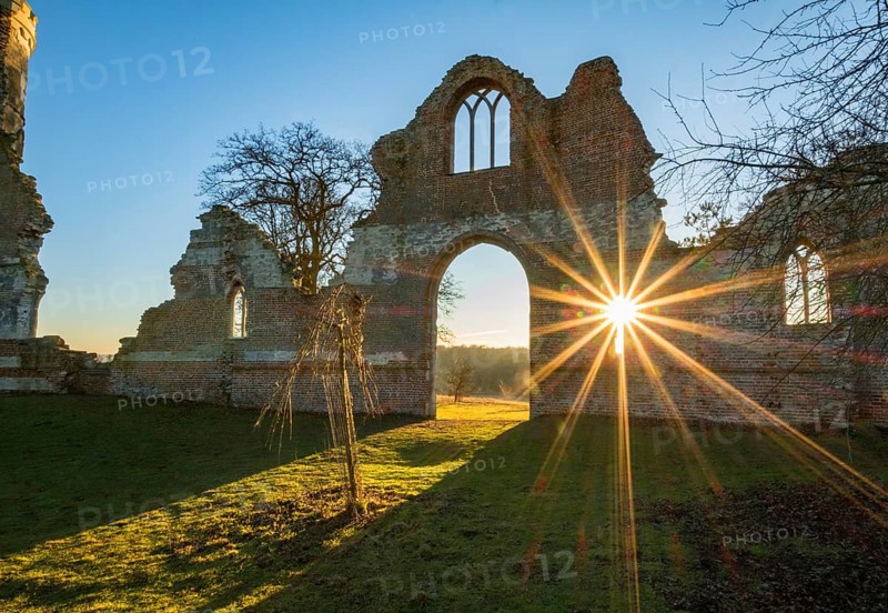 Sunburst through Wimpole Hall Folly, Cambridgeshire