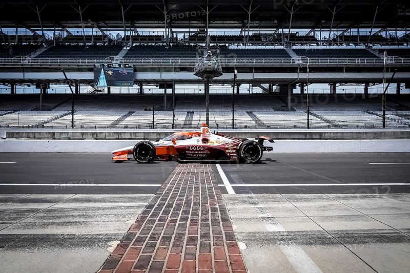 RYAN HUNTER-REAY (23) of Fort Lauderdale, Florida crosses the yard of bricks during a practice session for the Indy 500 at the Indianapolis Motor Speedway in Speedway, IN