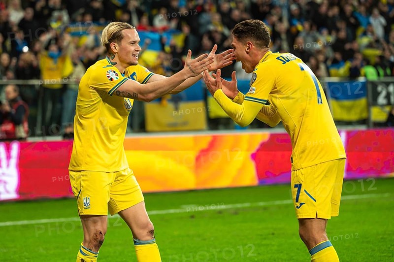 WROCLAW, POLAND - MARCH 26, 2024: Qualifications for UEFA Euro 2024. Final play-off match Ukraine - Iceland 2:1. Joy of Mykhailo Mudryk (L) and Georgiy Sudakov (R) after scoring goal.