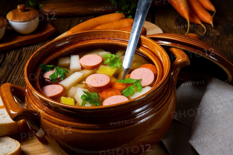 Potato and kohlrabi soup with bockwurst sausage