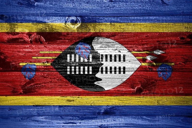 Eswatini flag on wooden planks background wood flag