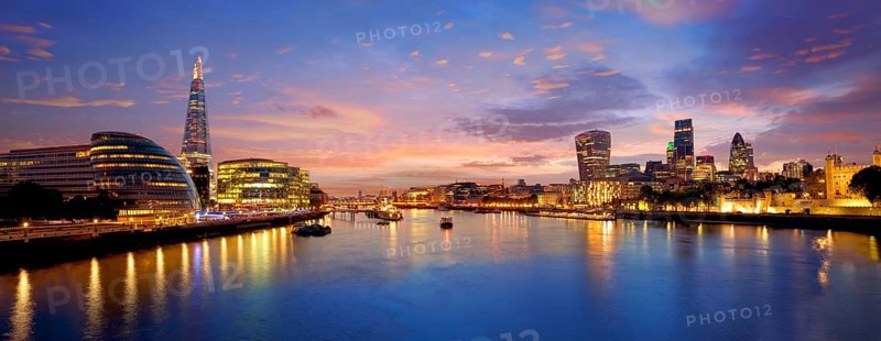 London skyline sunset with City Hall and financial on Thames river