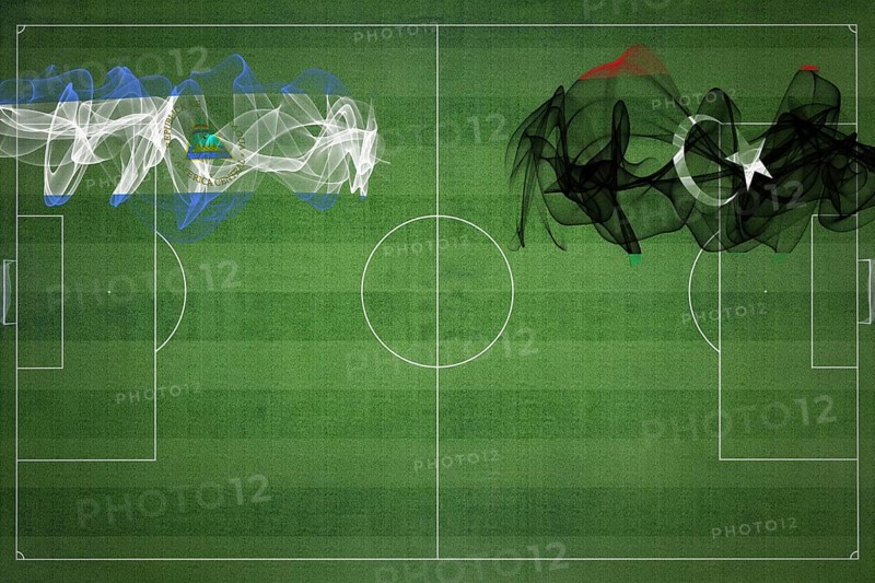 Nicaragua vs Libya Soccer Match, national colors, national flags, soccer field, football game, Competition concept, Copy space