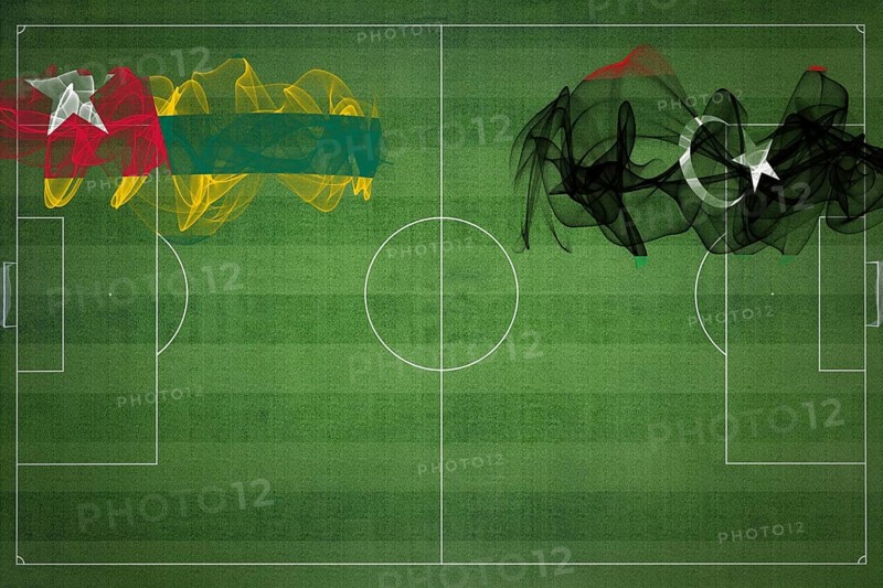 Togo vs Libya Soccer Match, national colors, national flags, soccer field, football game, Competition concept, Copy space