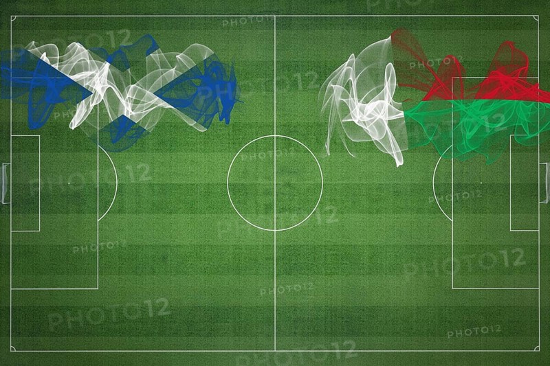 Scotland vs Madagascar Soccer Match, national colors, national flags, soccer field, football game, Competition concept, Copy space