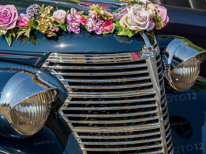 Vintage car with flower arrangement and chrome-plated radiator grille, Bocholt, Münsterland, Germany, Europe