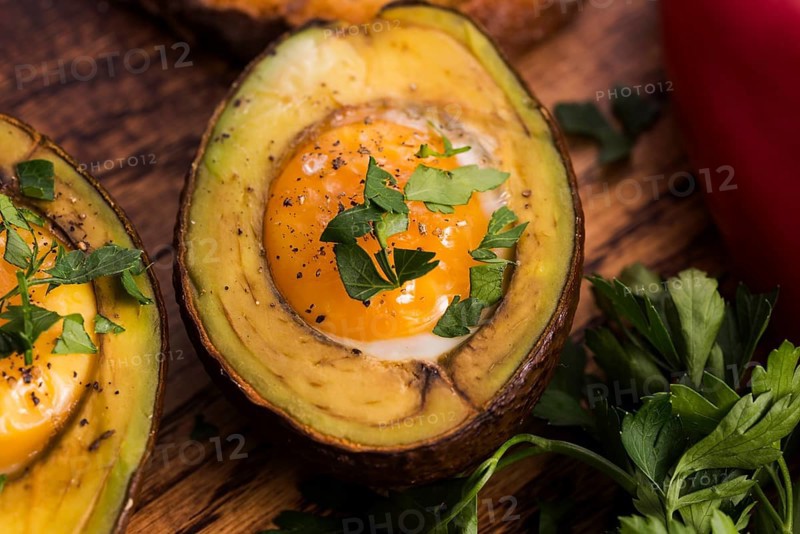 Homemade Organic Egg Baked in Avocado with Salt and Pepper