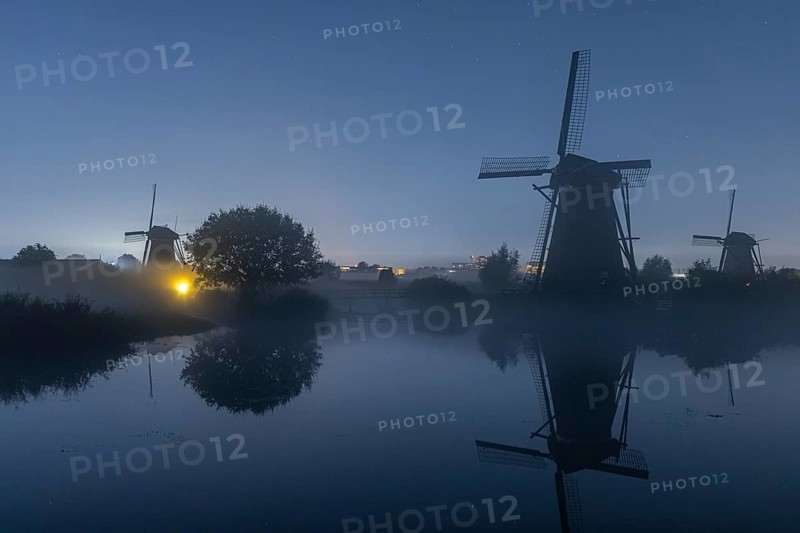 Foggy moonlit night at Kinderdijk, Netherlands