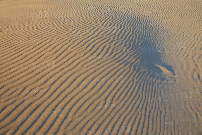 Sand waves texture in a Mediterranean beach at Spain