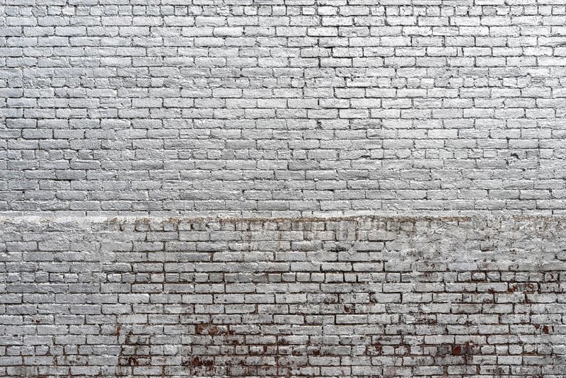 Brick wall texture painted in silver color grunge background