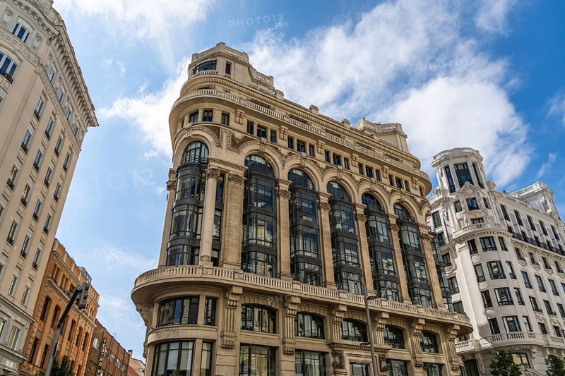 Madrid, Spain, October 10, 2021: Low angle view of the facade of the Matesanz building on Gran Via, designed by Antonio Palacios architect, Europe