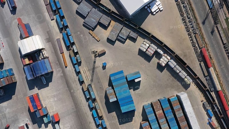 Aerial top view of cargo container terminal with railway, business transportation logistic in trade port