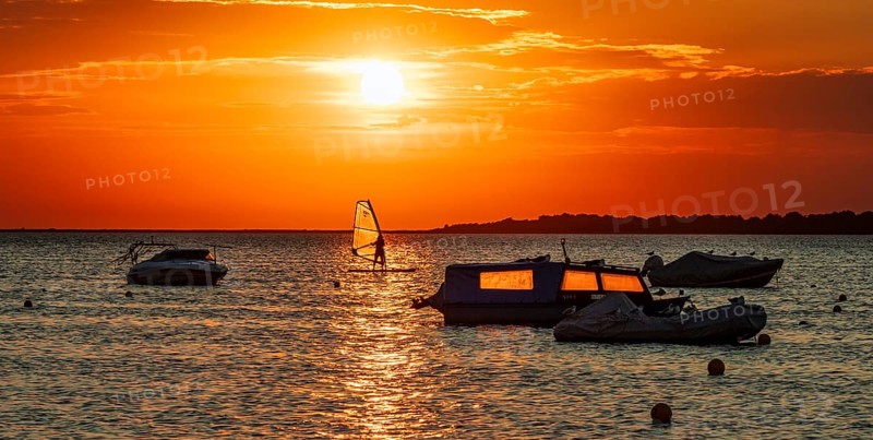 Atmospheric sunset by the sea Baltic coast Salzhaff