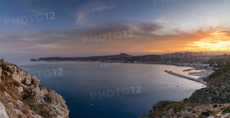 Panorama landscape view of Javea Bay and port in Alicante Province at sunset