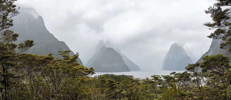 Magnificent panoramic view of Milford Sound during rainy weather, South Island of New Zealand