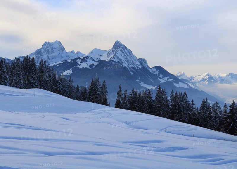 Winter evening in the Saanenland Valley, Switzerland, Europe