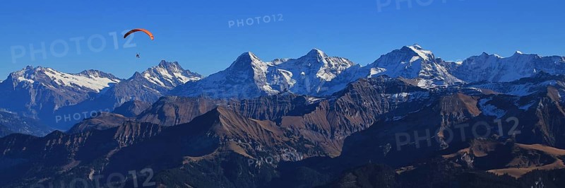 Famous mountains Eiger, Monch and Jungfrau seen from Mount Niesen