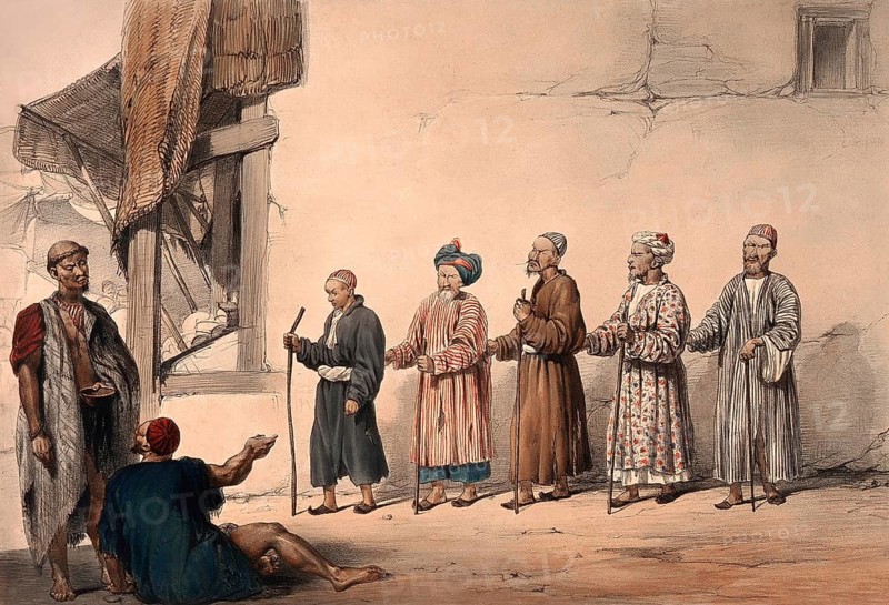 A 'kuttar' or line of blind beggars in a row, two other men in discussion, Kabul, Afghanistan. Coloured lithograph after L.W. Hart, 1843., Hart, Lockyer Willis, active 1843