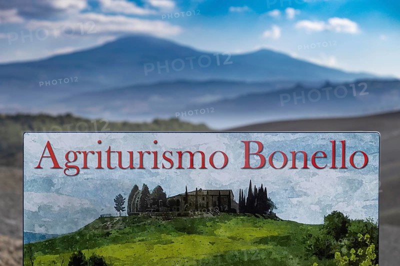 Agriturismo Bonello sign in a picturesque landscape with green meadows and mountains in the background, symbolic image, Val d'Orcia, Province of Siena, Tuscany, Italy, Europe