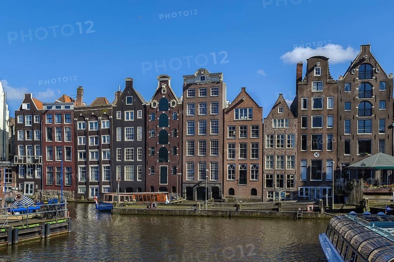 The so-called dancing house on the canal Damrak in Amsterdam