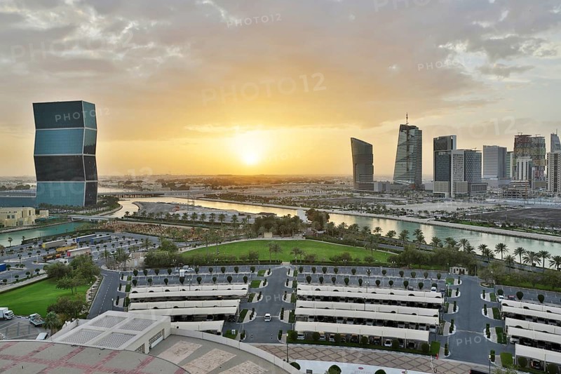 Aerial view of buildings and streets of Doha, Qatar during sunset. HDR image