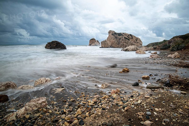 Seascape with windy waves during stormy weather at the rocky coastal area of the Rock of Aphrodite in Paphos area, Cyprus, Europe