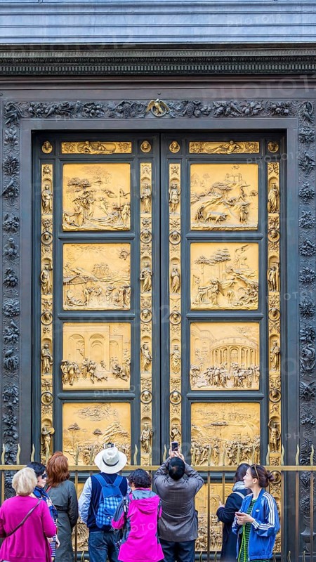 People at the Gates of Paradise at the Baptistery of St. John in Florence, Italy, Europe