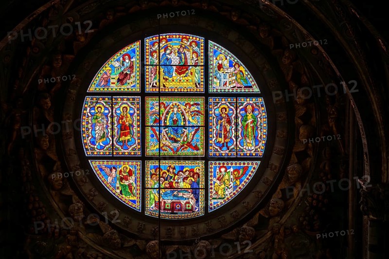 SIENA, ITALY, SEPTEMBER 23, 2023, Rich ornate window with mother mary above the presbytery of the Siena cathedral in Italy