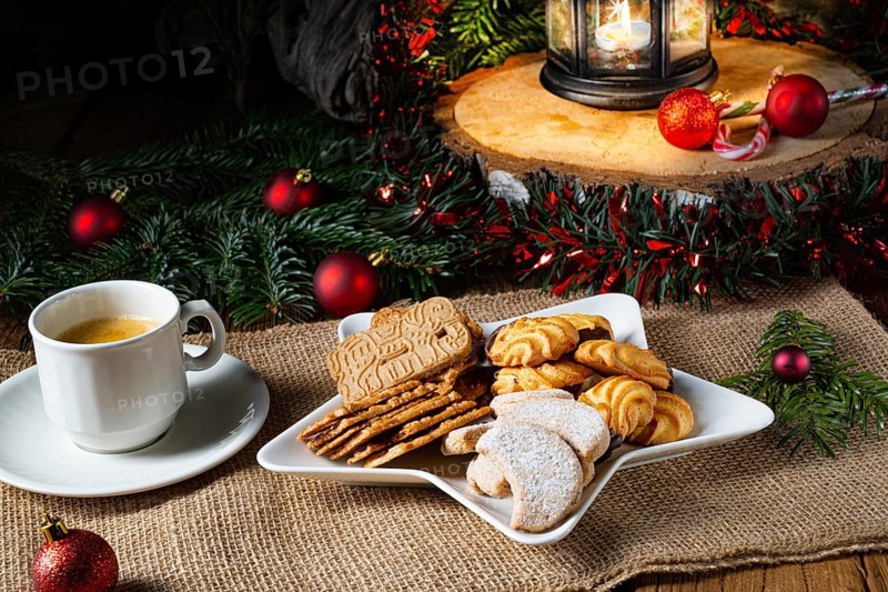 Different types of biscuits with rustic Christmas decorations