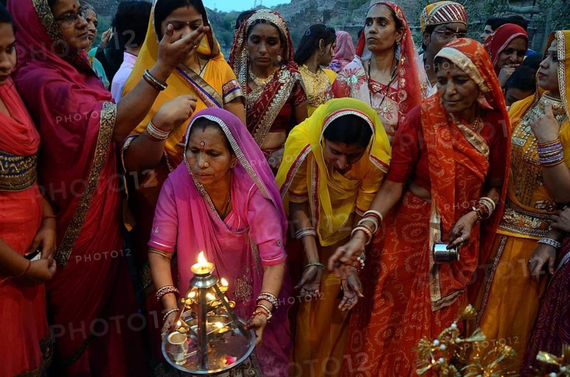 Women performing aarti of raj Gangaur Mehrangarh Fort Jodhpur rajasthan, India, Asia